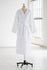 White, hooded robe on mannequin against a white background.